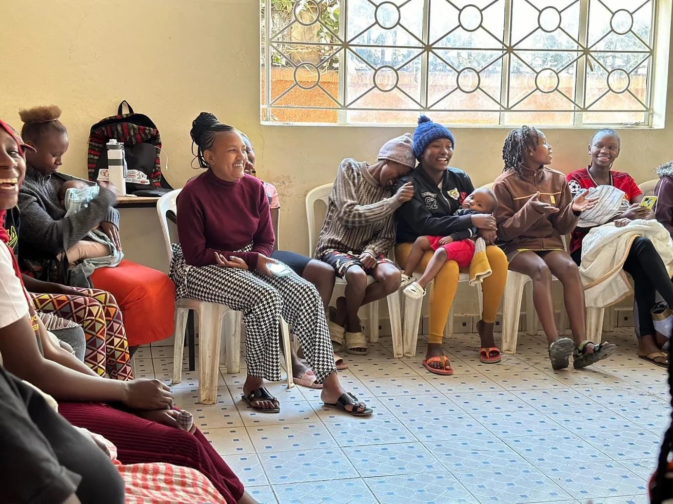 Young women taking part in a NairoBits sexual and reproductive health peer session in Nairobi