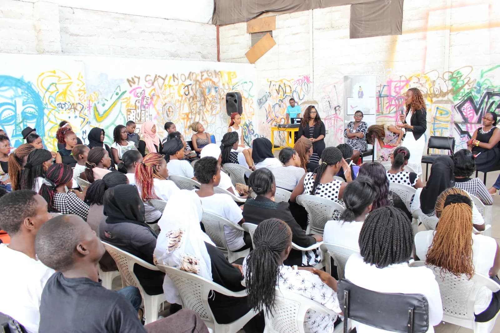 Young people filling a hall at a NairoBits job preparation workshop in Nairobi